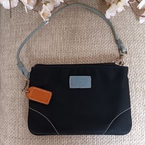 Coach black canvas wristlet.